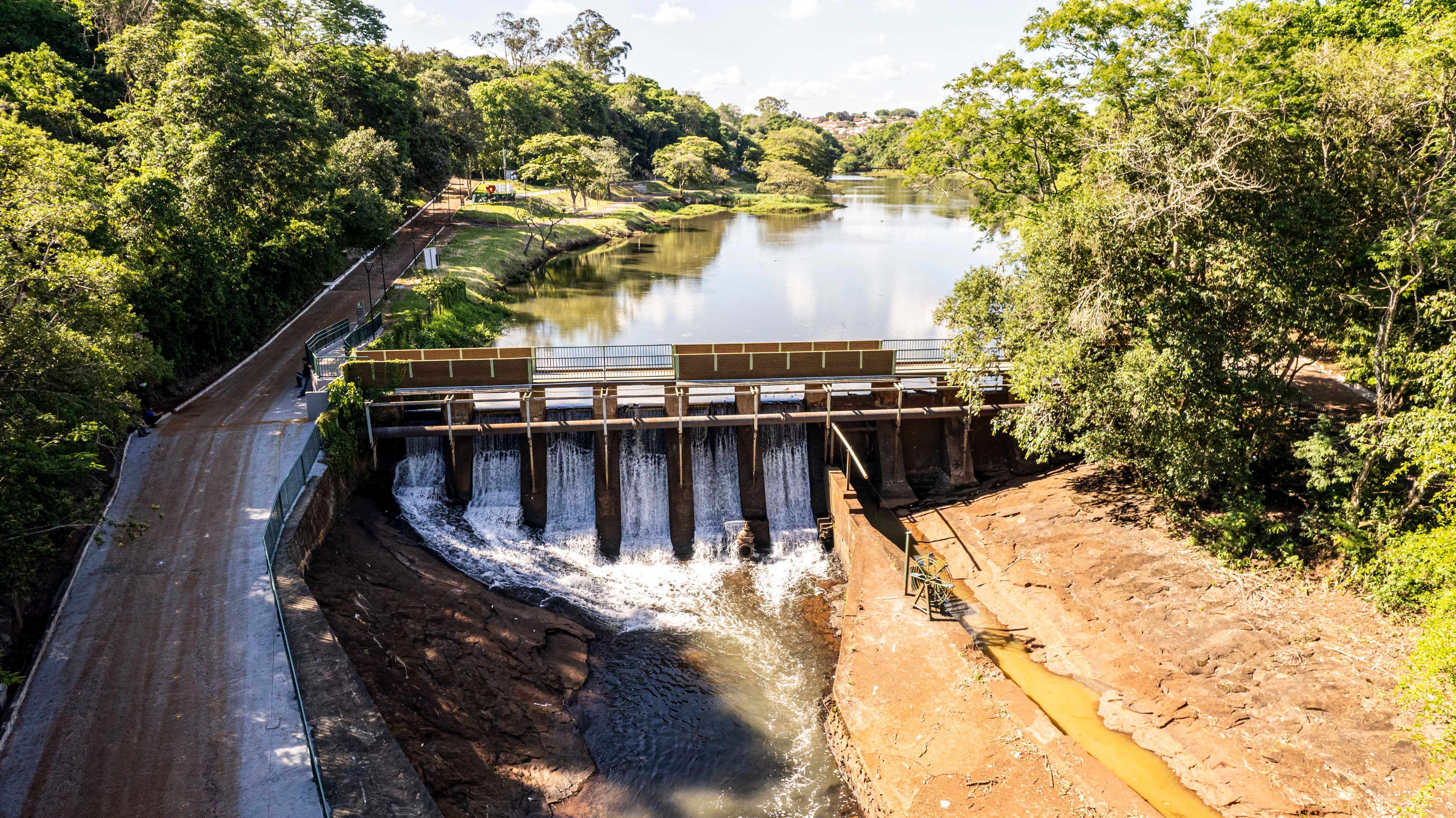 Aerial view of a large dam and reservoir in Brazil holding back water and mining waste